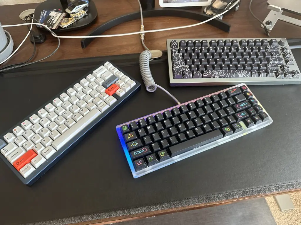 3 Mechanical Keyboards on Table