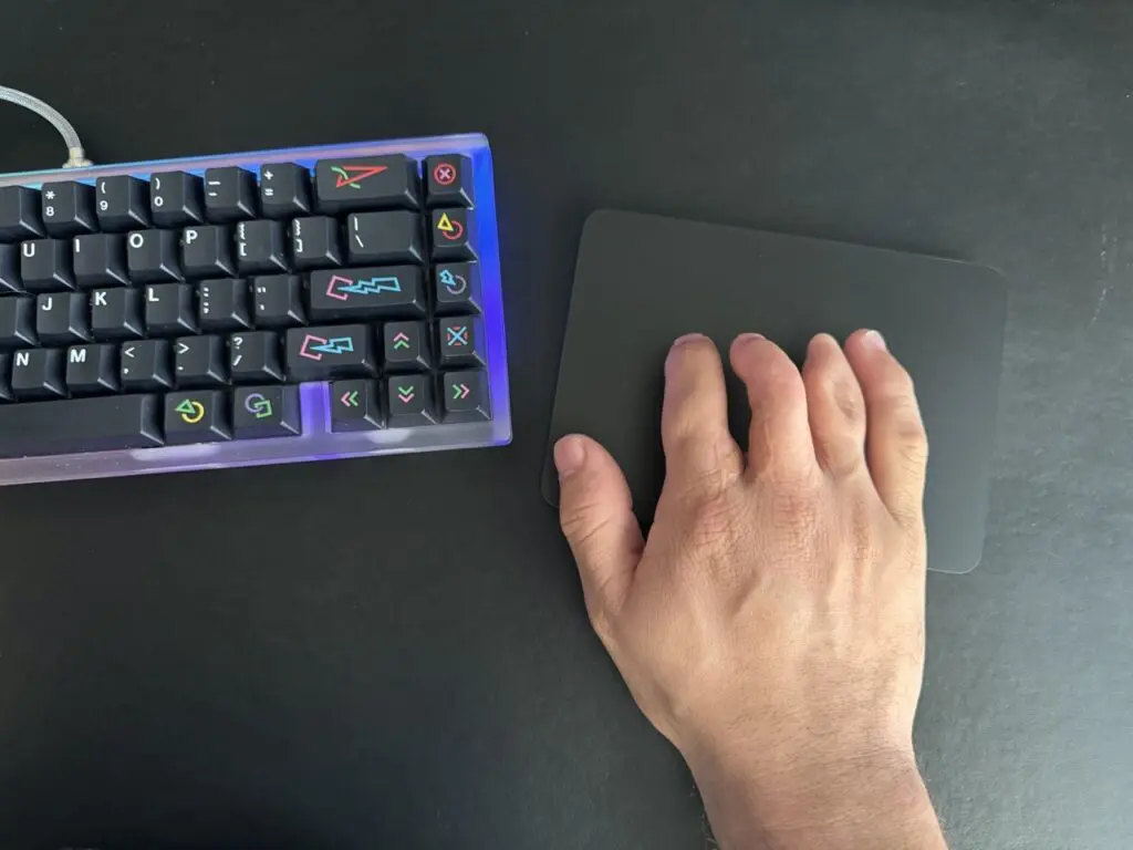 Apple Trackpad with my Hand Using It