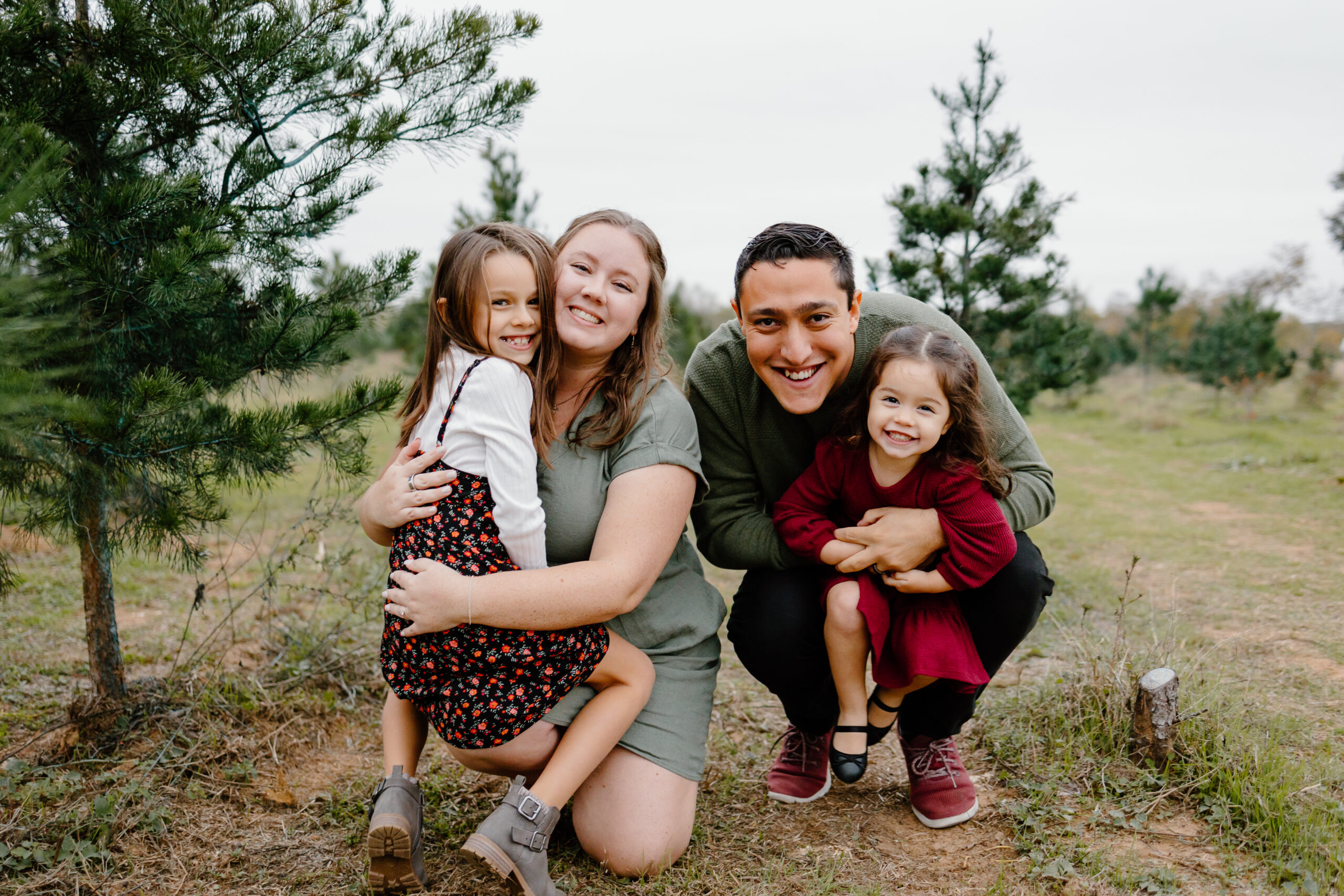 Leon Hitchens with Wife and Two Daughters