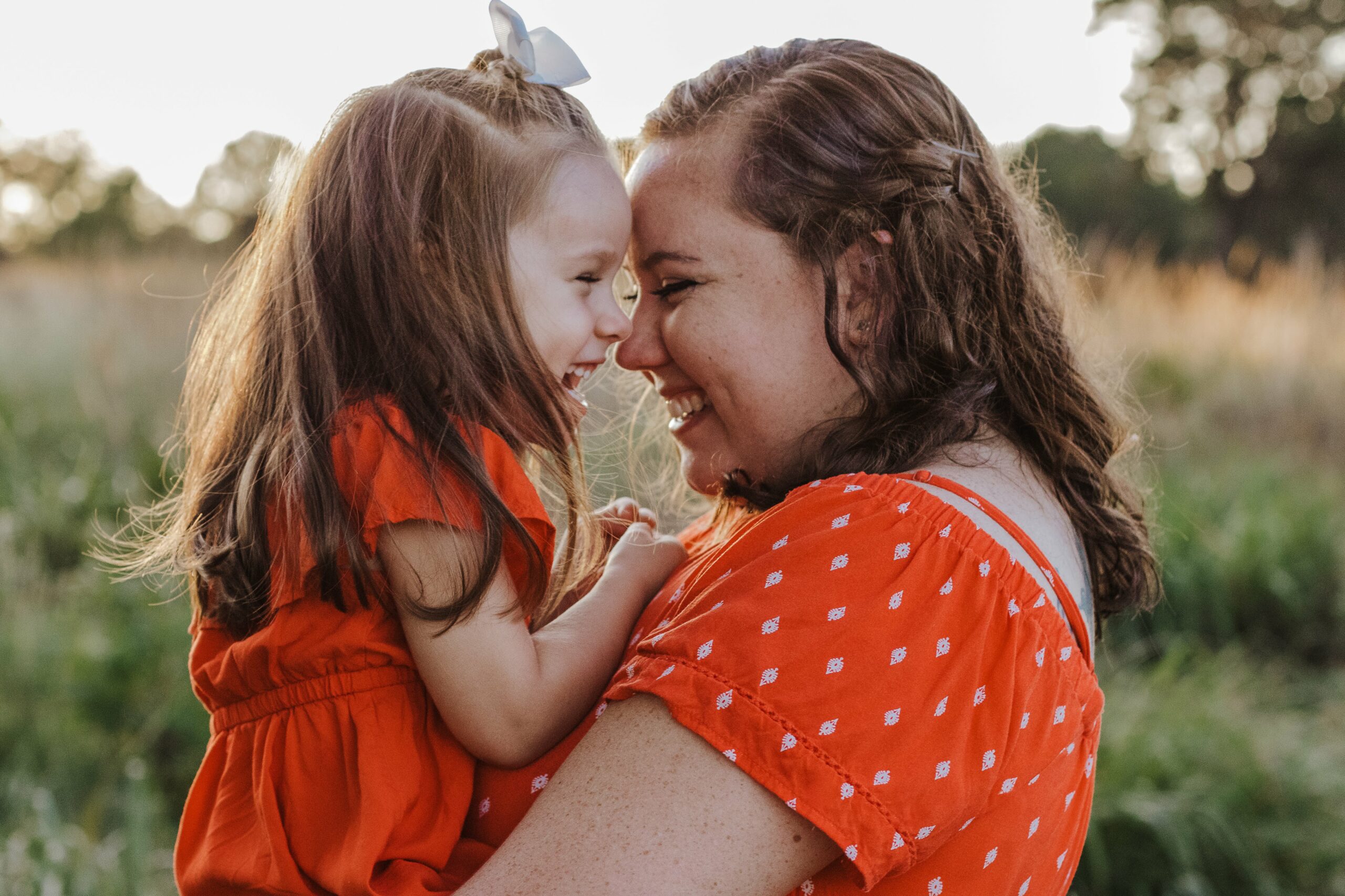 Mother with Daughter Smiling